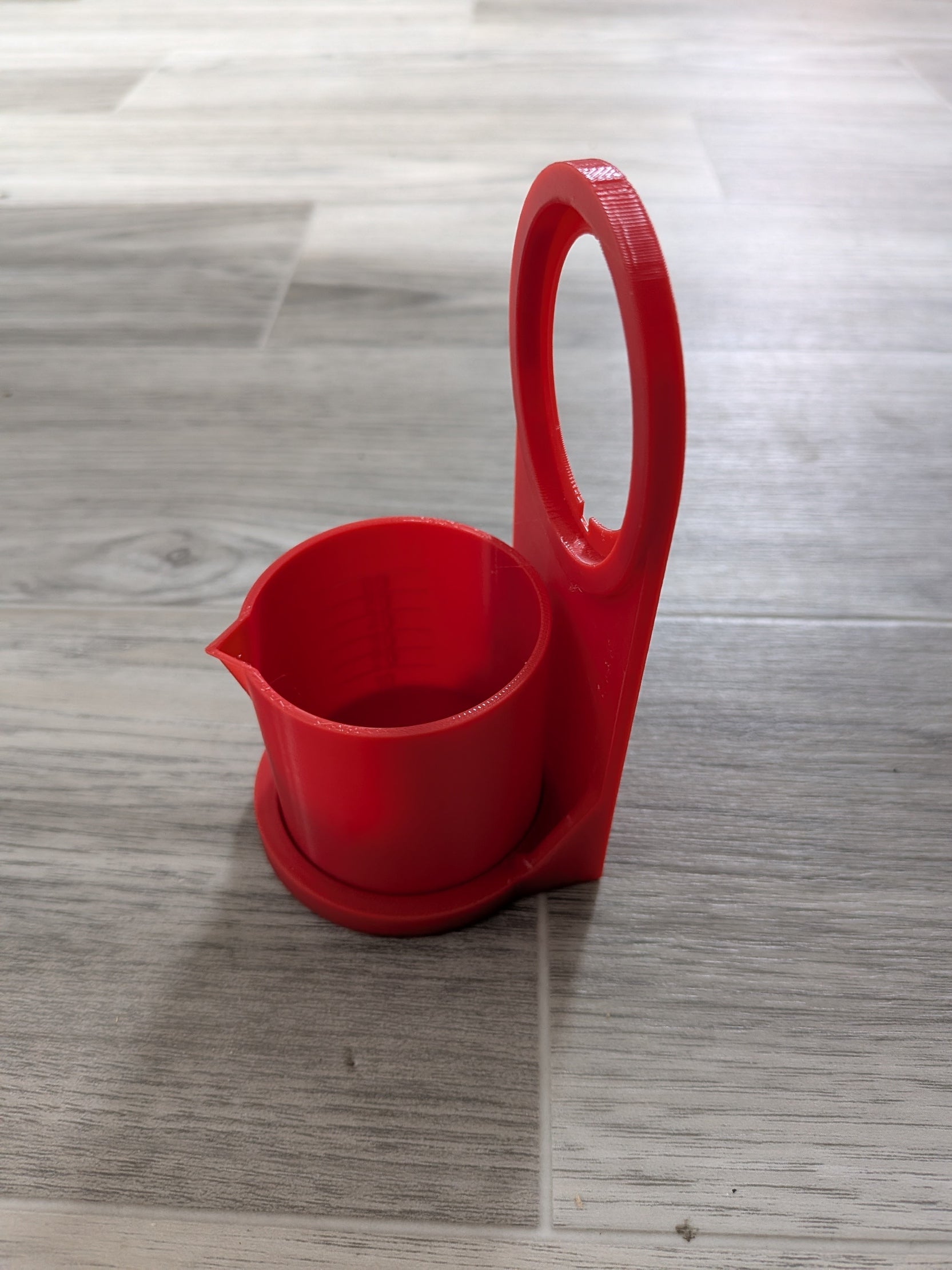 Tasse et porte gobelet pour détergent