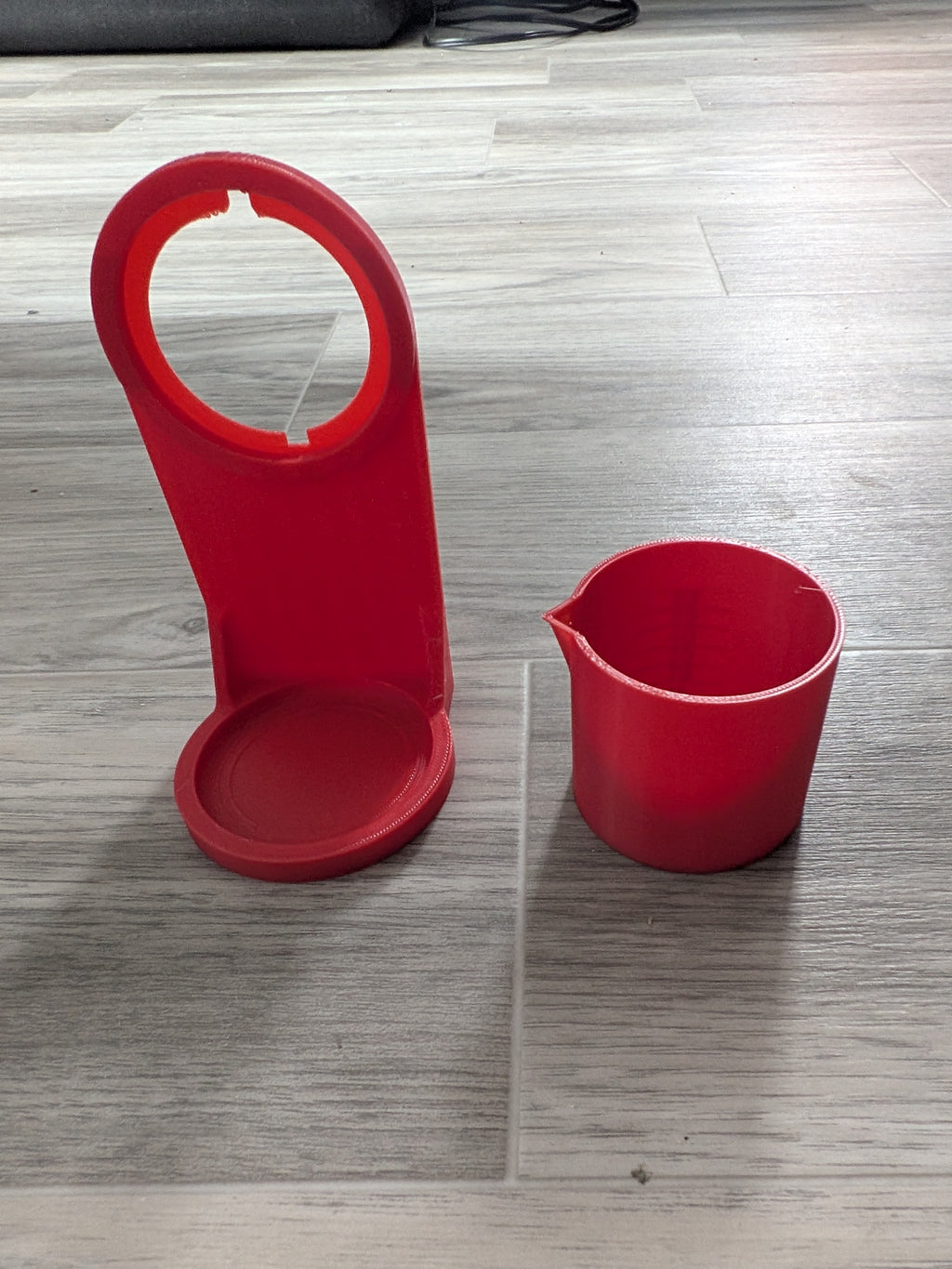 Tasse et porte gobelet pour détergent